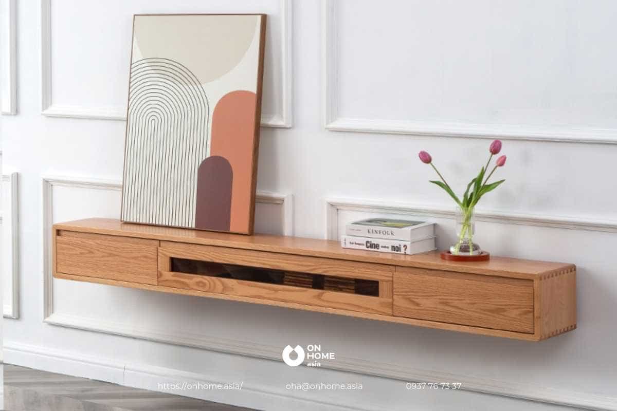 Kệ tivi treo tường gỗ tự nhiên là sản phẩm độc đáo với nhiều tính năng ưu việt, giúp tiết kiệm không gian và mang lại vẻ đẹp tối giản cho phòng khách của bạn. Chất liệu gỗ tự nhiên sẽ giúp sản phẩm có độ bền cao và đẹp mắt hơn trong thời gian sử dụng.