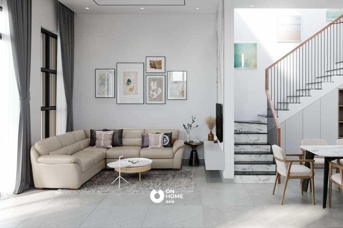 Bộ sofa sáng màu góp phần tạo sự cân bằng và ấm cúng cho tổng thể không gian phòng khách